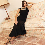 VESTIDO NEGRO VOLANTE